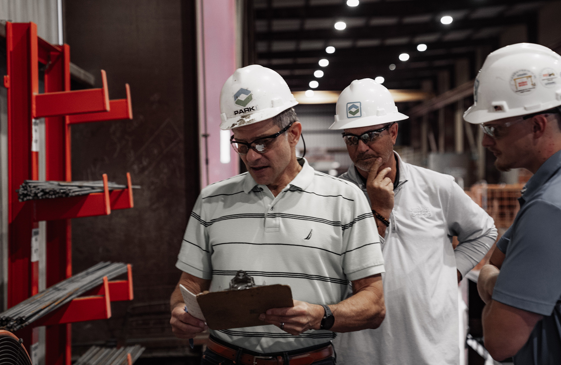 people inspecting products