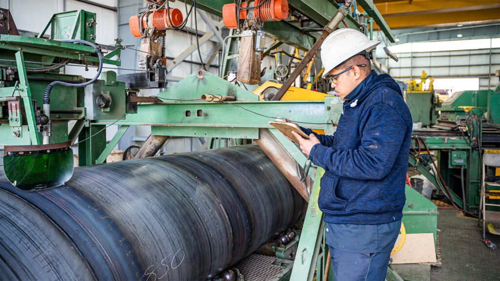 employee inspecting product