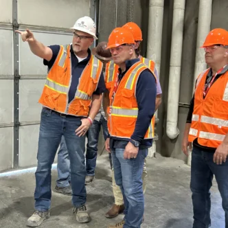 workers in orange vests