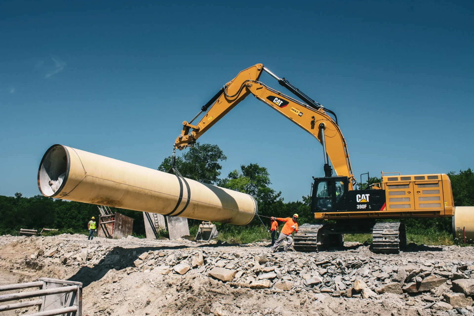 installing pipe with heavy machinery